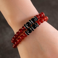 Carnelian 8mm Beads with Black Agate and Black and Silver Accent Beads Double Wrap Elastic Gemstone Bracelet Main Image
