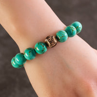 Howlite Turquoise 12mm Gemstone Bead Elastic Bracelet with Gold Accent Bead Main Image