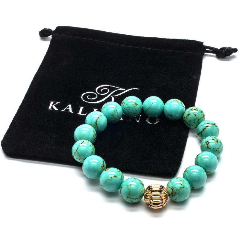 Kalifano Gemstone Bracelets Howlite Turquoise 12mm Gemstone Bead Elastic Braceletwith Gold Accent Bead RED-BGP-053