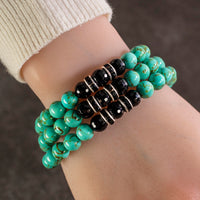 Howlite Turquoise 8mm Beads with Black Agate and Crystal Accent Beads Triple Wrap Elastic Gemstone Bracelet Main Image