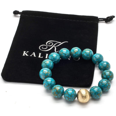 Kalifano Gemstone Bracelets Turquoise 13mm Gemston Bead Braceletwith Gold Accent Bead RED-BGP-047
