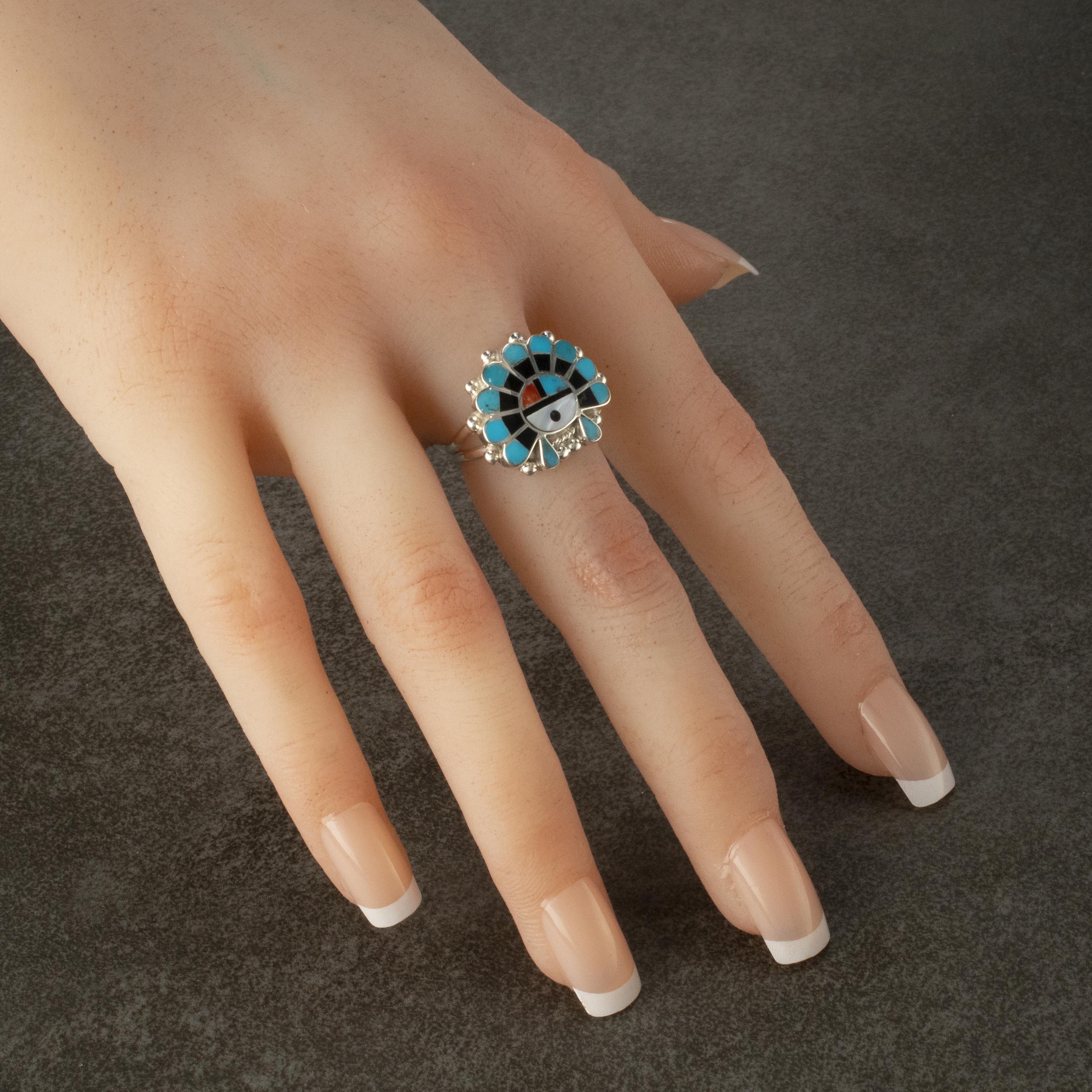 Coral nails with pearl nail gems